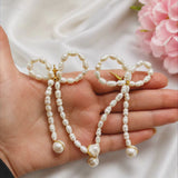 Ivory Bow Elegance Earring